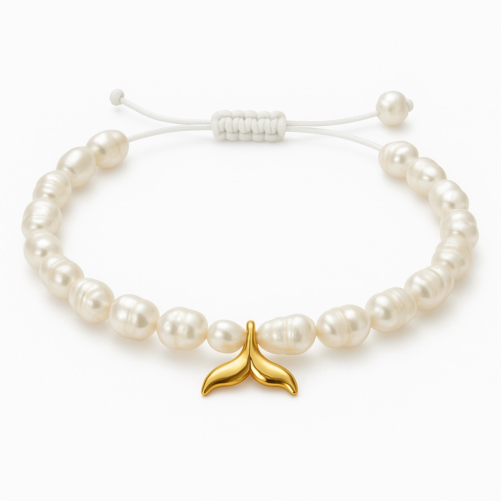 دستبند مرواریدی با پلاک دم نهنگ کد 100134 دستبند مرواریدی با پلاک دم نهنگ کد 100134