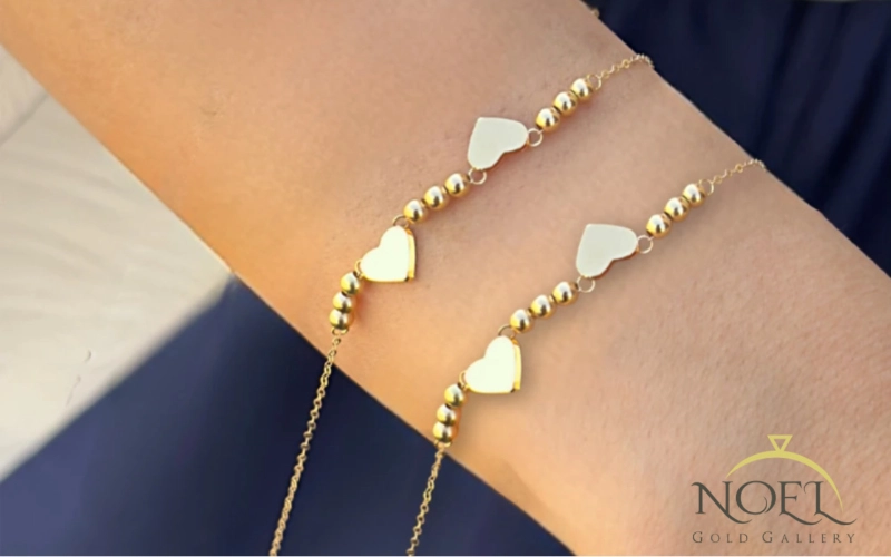 دستبند طلا دو قلب گویدار کد 100123